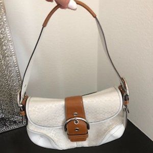 White and tan Coach purse